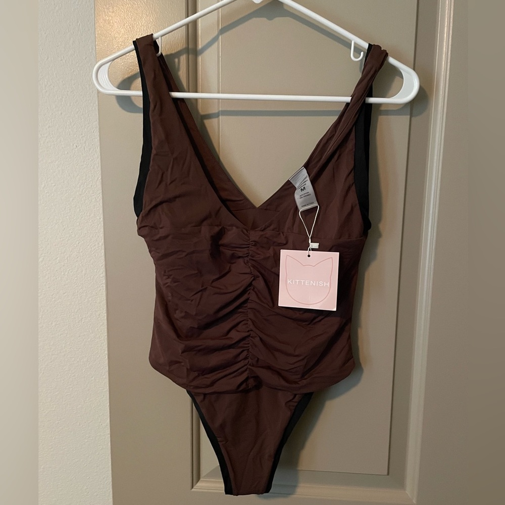 Kittenish one piece